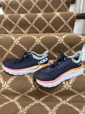 Hoka womans Navy Running Shoes with Pink & Orange Accents